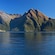 A fjord surrounded by wooded mountains